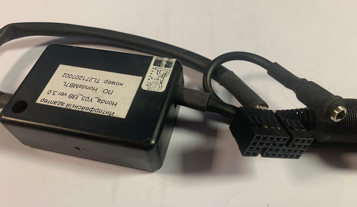 Honda (replaces CD changer) universal adapter AUX.